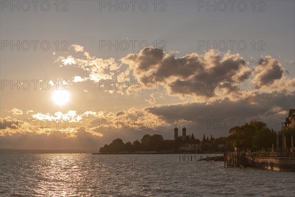 Baroque castle church, double tower, onion dome, evening light, Friedrichshafen on Lake Constance