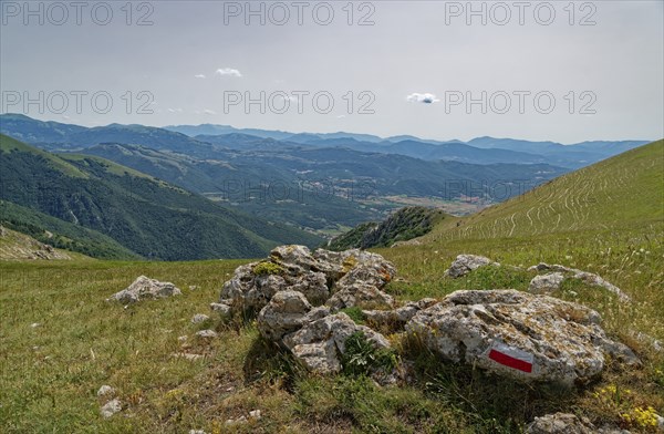 Mountain landscape on the edge of the Pian Grande di Castelluccio di Norcia plateau in the Monti