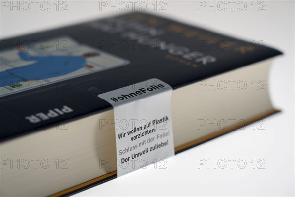 Book, new edition, without plastic packaging, plastic film, only with a paper seal, waste avoidance