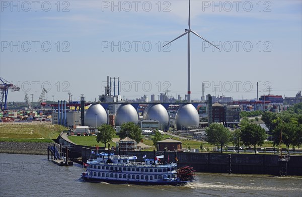 Europe, Germany, Hamburg, Köhlbrandhöft sewage treatment plant, view of the digestion towers, Elbe