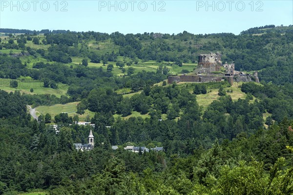 View of the medieval castle of Murol in the Auvergne Volcanoes Regional Natural Park, Puy de Dome,