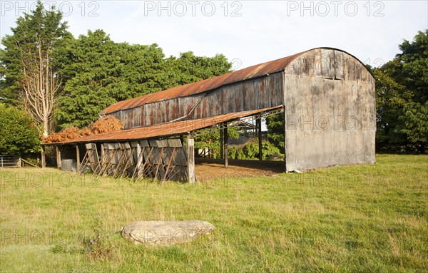Rusty old barn in Compton Bassett, near Calne, Wiltshire, England, UK