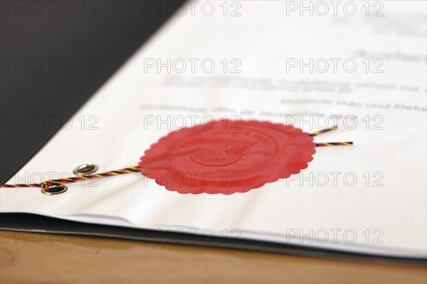 Notarised contract with red official seal
