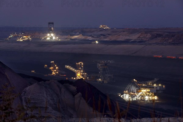 Lignite excavators extract coal in the Welzow open-cast mine, operated by LEAG. The lignite is