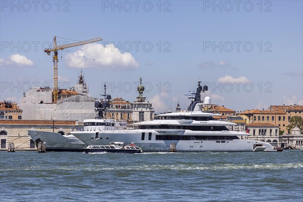 Exclusive private yachts moored on the Canale della Giudecca off Venice, Venice, Italy, Europe