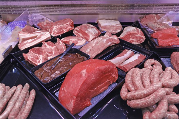 Variety of fine meat products in the butchery (Variety of fine meat products in the butchery)