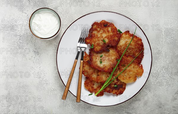 Potato pancakes, pancakes with sour cream, Belarusian dish, homemade, no people