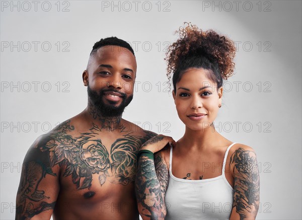 Portrait, tattoo, tattoo, an African-American couple with heavy tattoos on neck and upper body, AI