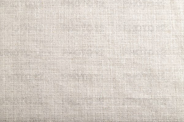 Fragment of smooth white linen tissue. Top view, flat lay, natural textile background and texture