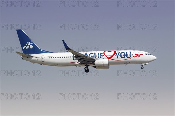 A Boeing 737-800 Smartwings aircraft with the licence plate OK-TVF and the Prague Loves You special