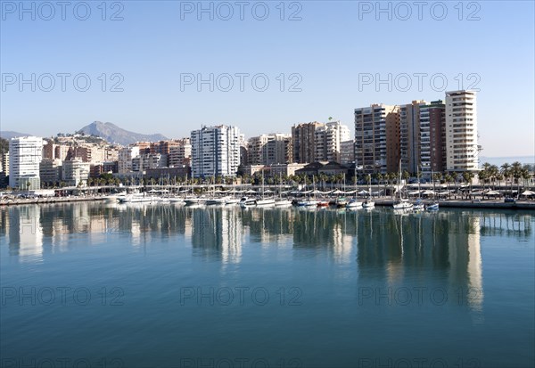 Apartment blocks and yachts in marina of Muelle Uno port development, city of Malaga, Spain, Europe