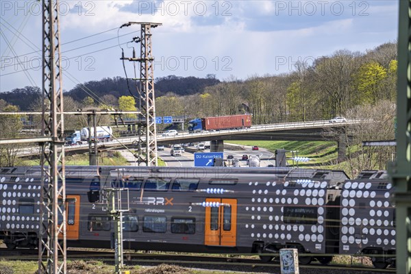 Regional Express, Rhine-Ruhr Express, RRX train on the railway line at the Kaiserberg motorway