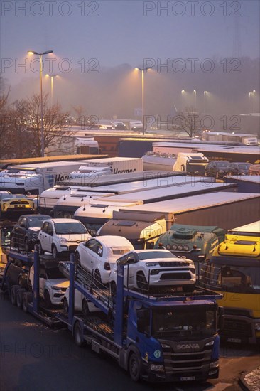 Heavy traffic on the A2 at the Bottrop-Süd service area, overcrowded lorry parking in the evening,