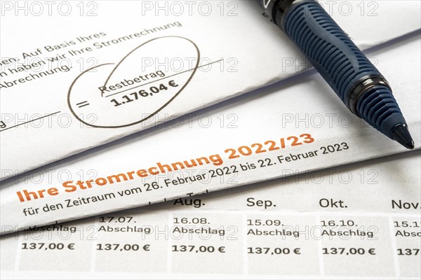 Symbolic image of electricity bill, billing of an electricity provider, additional payment due to