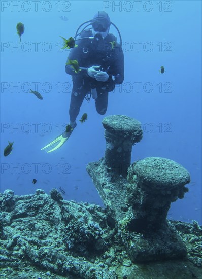 Diver on the upper deck, dive site wreck of the Thistlegorm, Red Sea, Egypt, Africa