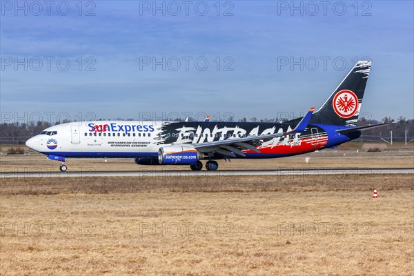 A Boeing 737-800 aircraft of SunExpress with the registration TC-SPC and the Eintracht Frankfurt