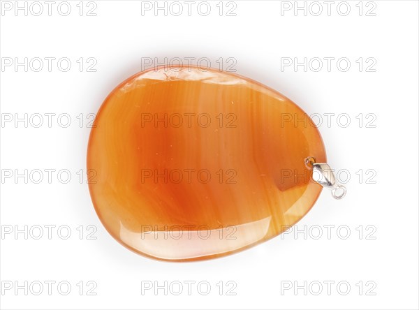 Orange onyx pendant isolated on white background, close up