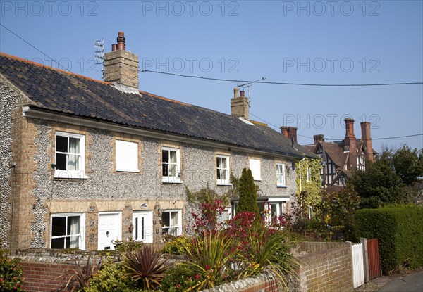 Attractive traditional flint faced cottages in Overstrand, Norfolk, England, United Kingdom, Europe