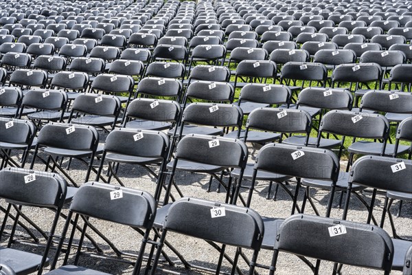 Chairs marked with numbers, rows of seats, rows of chairs at a music festival, Salem Castle, former