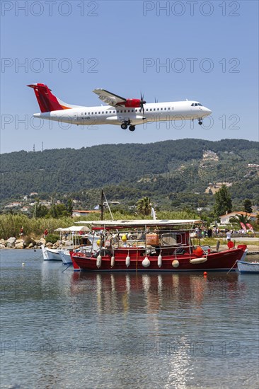 An Air Connect ATR 72-600 aircraft with the registration YR-ACB at Skiathos Airport, Greece, Europe