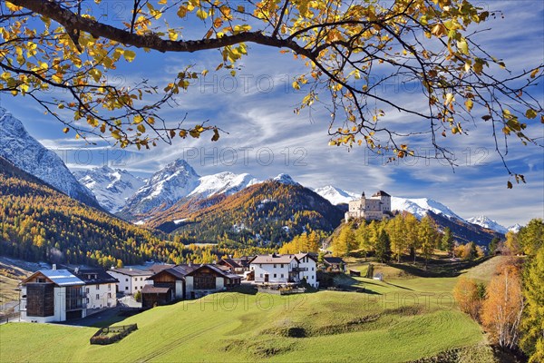 Village view of Tarasp with castle in autumn, Scuol, Canton Graubünden, Switzerland, Europe