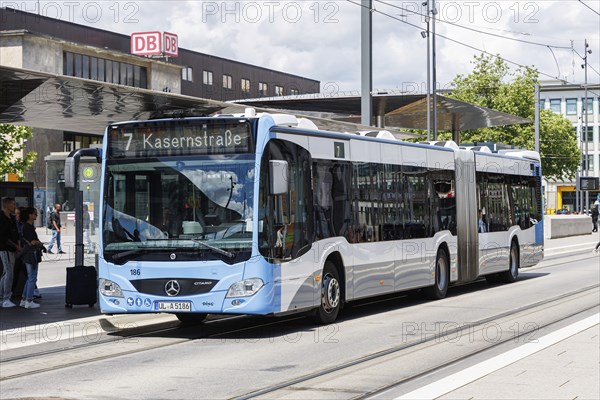 Mercedes-Benz Citaro public transport bus at the main railway station stop in Ulm, Germany, Europe