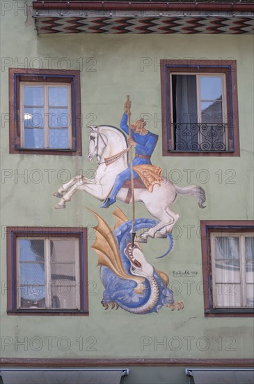 Fresco of St George and the dragon from 1954, on the façade of the former town chancellery and