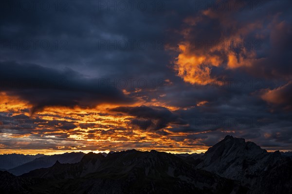 Montafon mountains with dramatic cloudy sky at sunrise, Tschagguns, Rätikon, Montafon, Vorarlberg,
