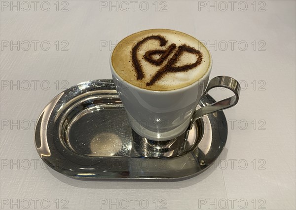 Cappuccino with Café de Paris logo made from cocoa on milk foam, Café de Paris, Dubai Mall,