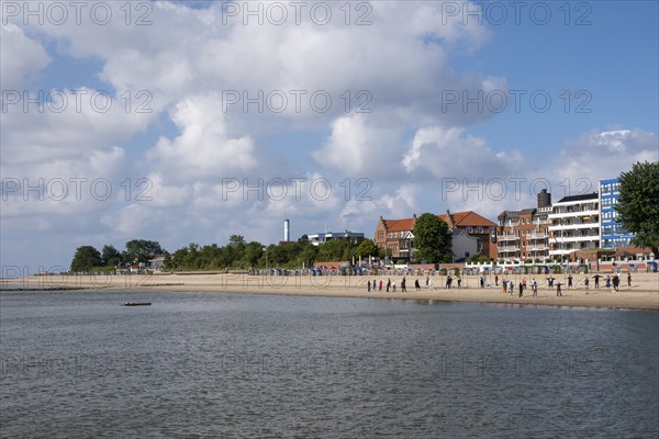 People doing early morning sports on the beach, North Sea coast, Wyk, Föhr, North Sea island, North