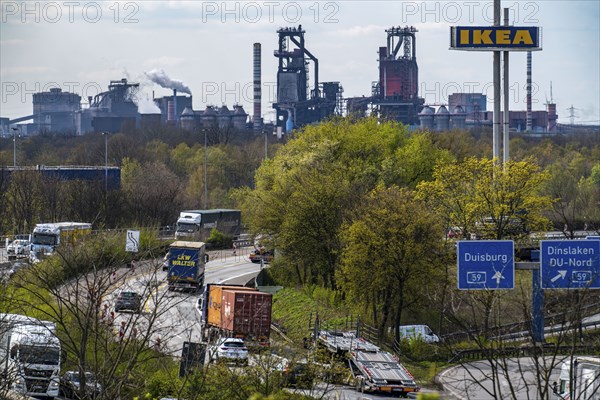 Duisburg-Nord motorway junction, A42 and A59 motorways, heavy traffic, blast furnaces of