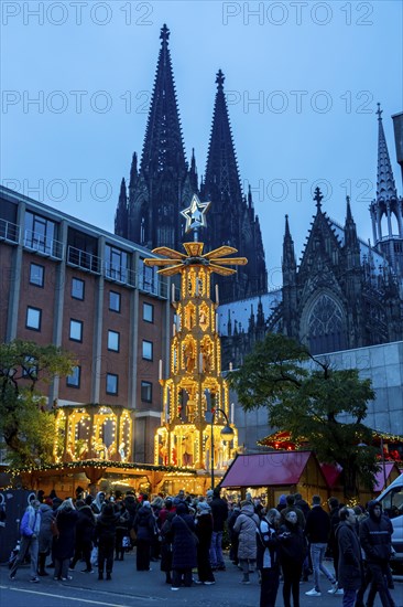 Christmas market at Roncalli Platz am Dom, in the city centre of Cologne, Sunday shopping in