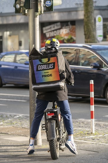 Bicycle courier from the fast delivery service Gorillas, delivers groceries, currently in over 20