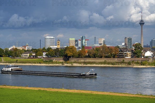The skyline of Düsseldorf, with the skyscrapers in the Media Harbour, Rhine bridges, Rhine Tower,