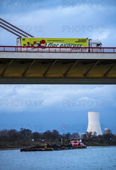 Beeckerwerther Brücke, motorway bridge, A42, truck, cargo ship on the Rhine, behind the STEAG