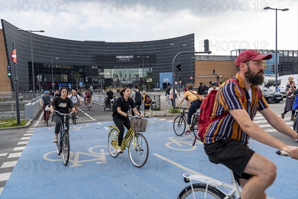 Cyclists on cycle paths, at the shopping centre Fisketorvet, Sydhavnen, in the city centre of