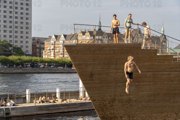 Summer, swimming in the harbour of Copenhagen, there are official bathing places, harbour baths and