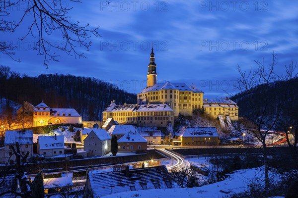 Winter evening in the Müglitz valley, impressively illuminated Weesenstein Castle at the blue hour,
