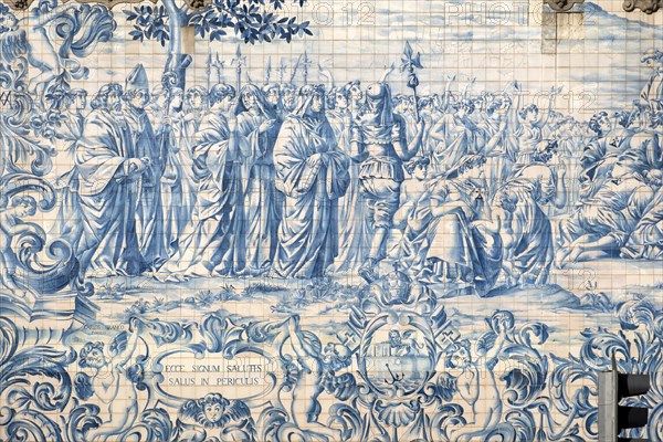 A detailed view of the exquisite blue and white azulejos tiles adorning the walls of Igreja do