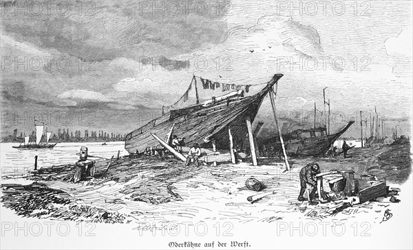 Oder barges at the shipyard, Stettin or Szczecin, Poland, river, bank, shipbuilding, repair,
