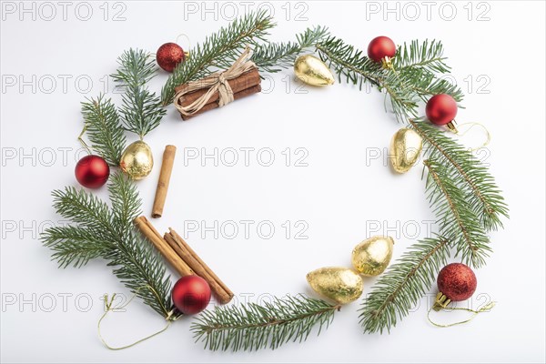 Christmas or New Year wreath composition. Decorations, balls, fir and spruce branches, on white