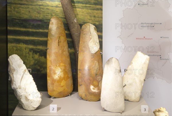 Close up of neolithic axes in display case. With permission of Wiltshire Museum, Devizes, England,