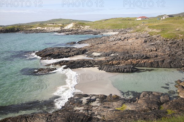 Atlantic coastline rocky headlands and small sandy bays near Borgh, Barra, Outer Hebrides,
