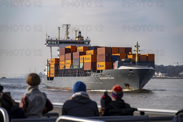 Trip with the Hadag harbour ferry on the Elbe, shortly in front of Finkenwerder, feeder ship
