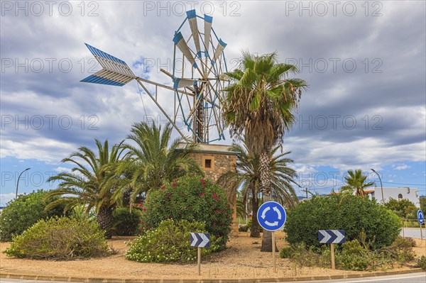 Windmill in a roundabout in Sant Jordi, Ibiza, Balearic Islands, Mediterranean, Spain, Europe