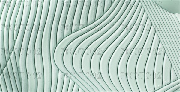 Abstract background, pale blue color, curved lines, texture, photo, selective focus, horizontal, no