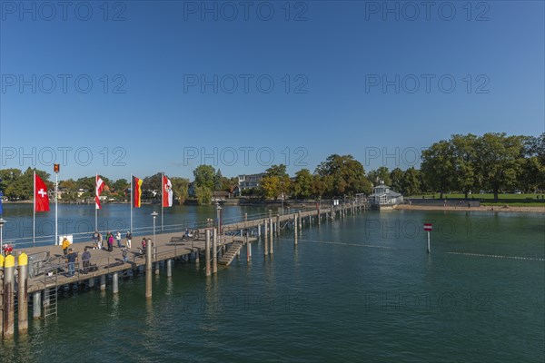 Nonnenhorn on Lake Constance, jetty, marina, townscape, flags, blue sky, Bavaria, Germany, Europe