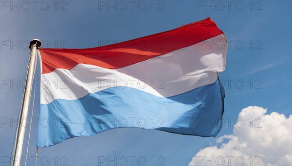 Flags, the national flag of Luxembourg flutters in the wind