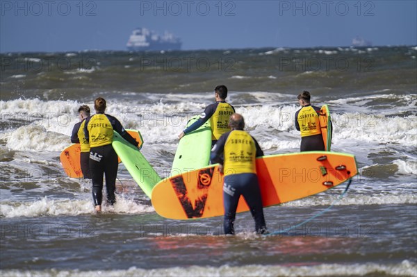Course for surfers, surfing beginners, on the beach of Scheveningen, Netherlands