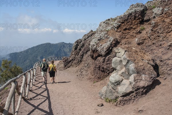 Tourists walking on a path to Vesuvius, near Naples, Parco Nazionale del Vesuvio, Campania, Italy,